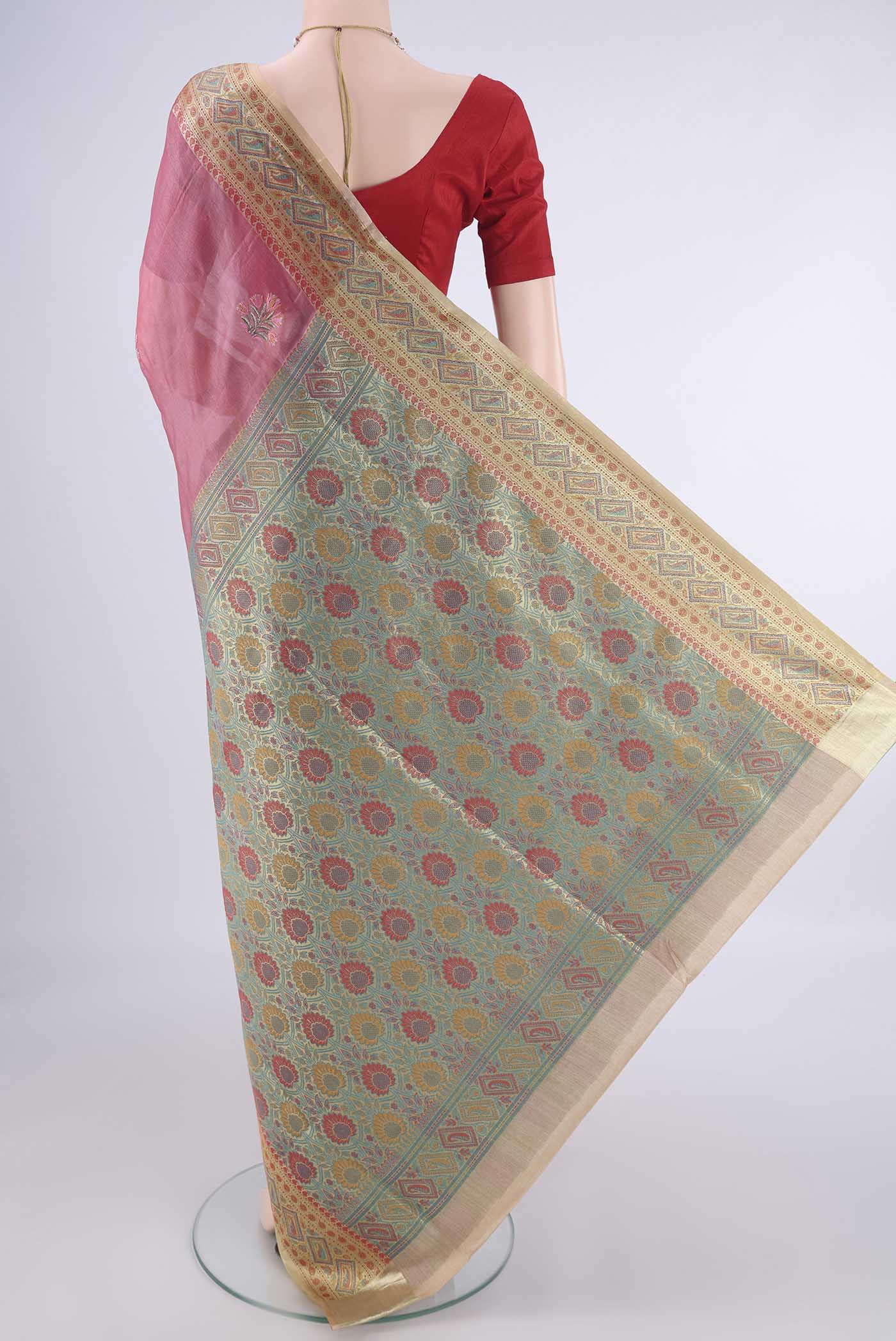 Flat view of Pink Banarasi Tussar Silk Saree with Embroidery on the body and Zari Border. 