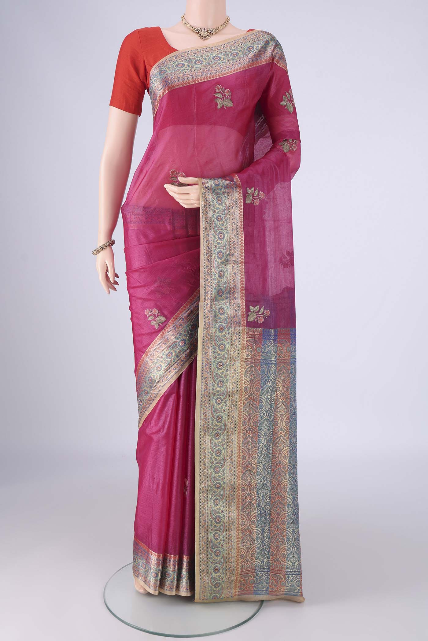 Dark Pink Banarasi Tussar Silk Saree with Embroidery on the body and Zari Border.  displayed on a mannequin