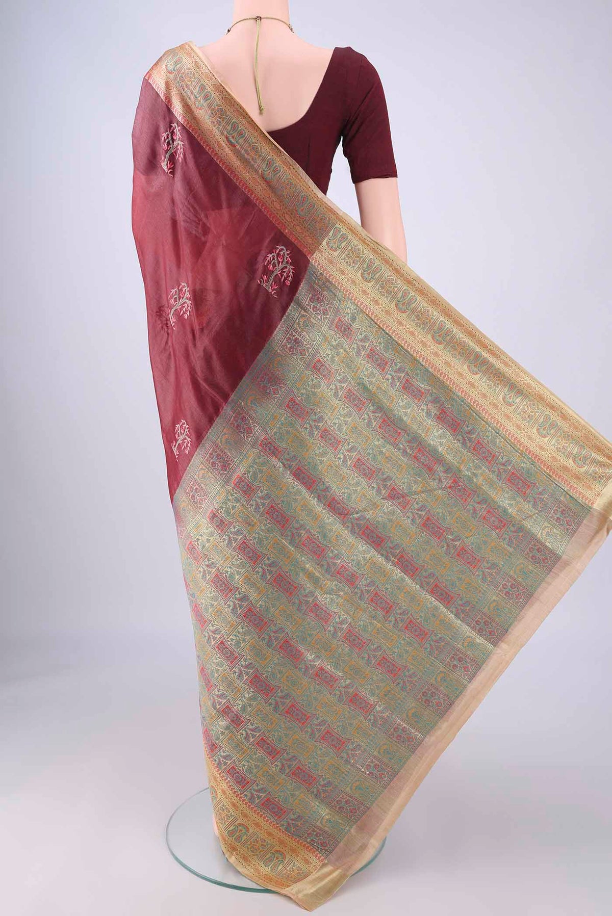 Flat view of Coffee Brown Banarasi Tussar Silk Saree with Embroidery on the body and Zari Border. 