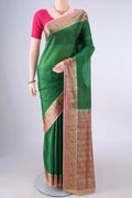 Green Banarasi Tussar Saree with Plain Body and Zari Border.  displayed on a mannequin