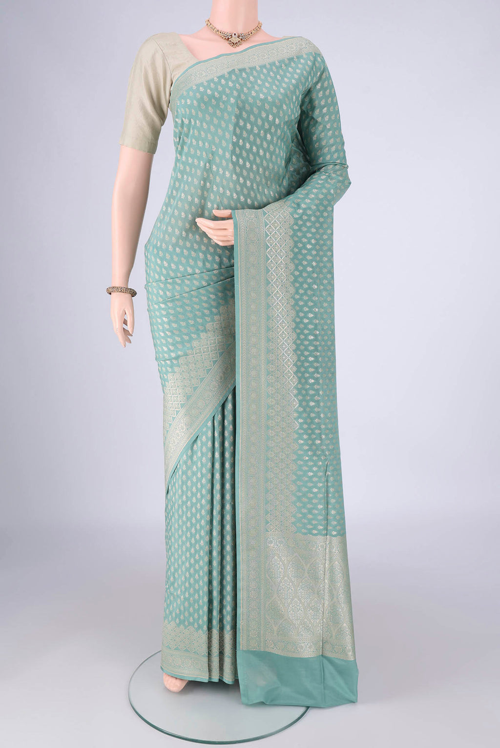 Sky Blue Banarasi Silk Saree with Zari Brocade on the body and Zari Border.  displayed on a mannequin