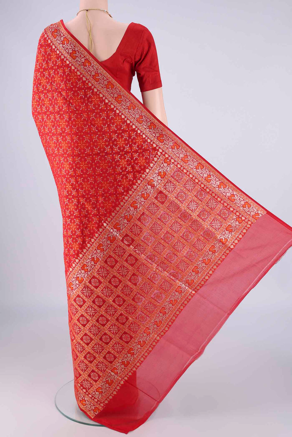 Flat view of Red Banarasi Silk Saree with Zari And Thread Butta on the body and Zari And Thread Border. 