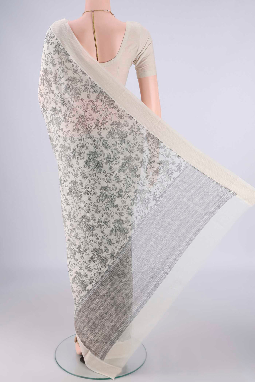 Flat view of Off White Chanderi Silk Cotton Saree with Printed design on the body and Thread Border. 