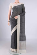 Black Chanderi Silk Cotton Saree with Printed design on the body and Thread Border.  displayed on a mannequin