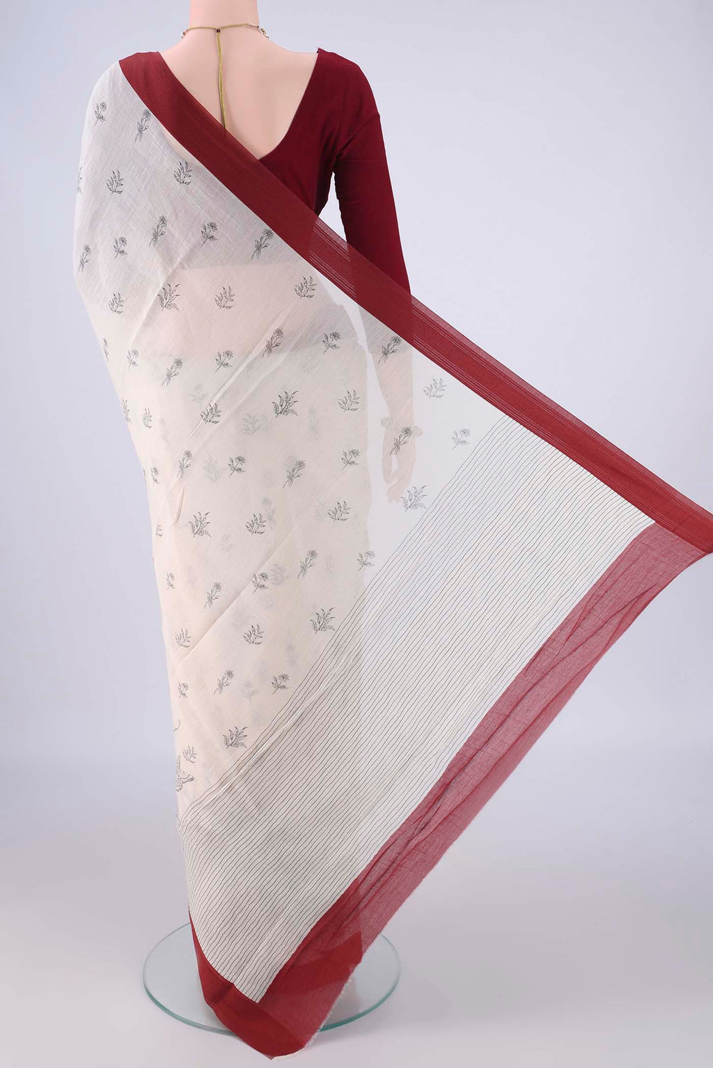 Flat view of Off White Chanderi Silk Cotton Saree with Printed design on the body and Thread Border. 