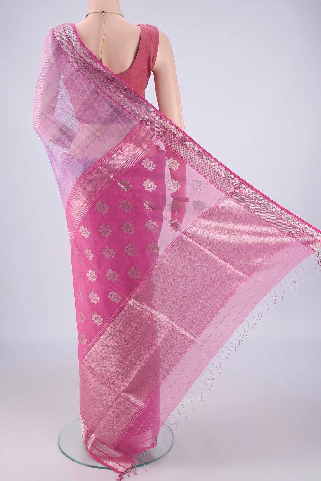 Flat view of Lavender Maheshwari Silk Cotton Saree with Stripes on the body and Zari Border. 