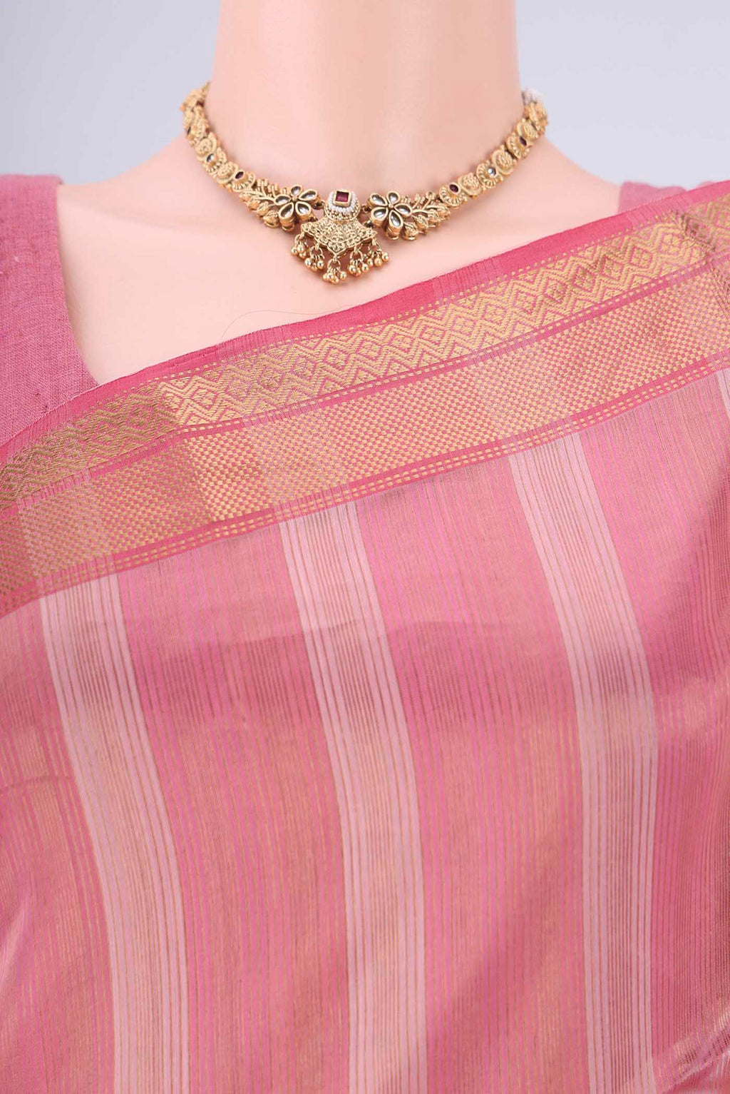 Border image of Peach Maheshwari Silk Cotton Saree with Stripes on the body and Zari Border. 