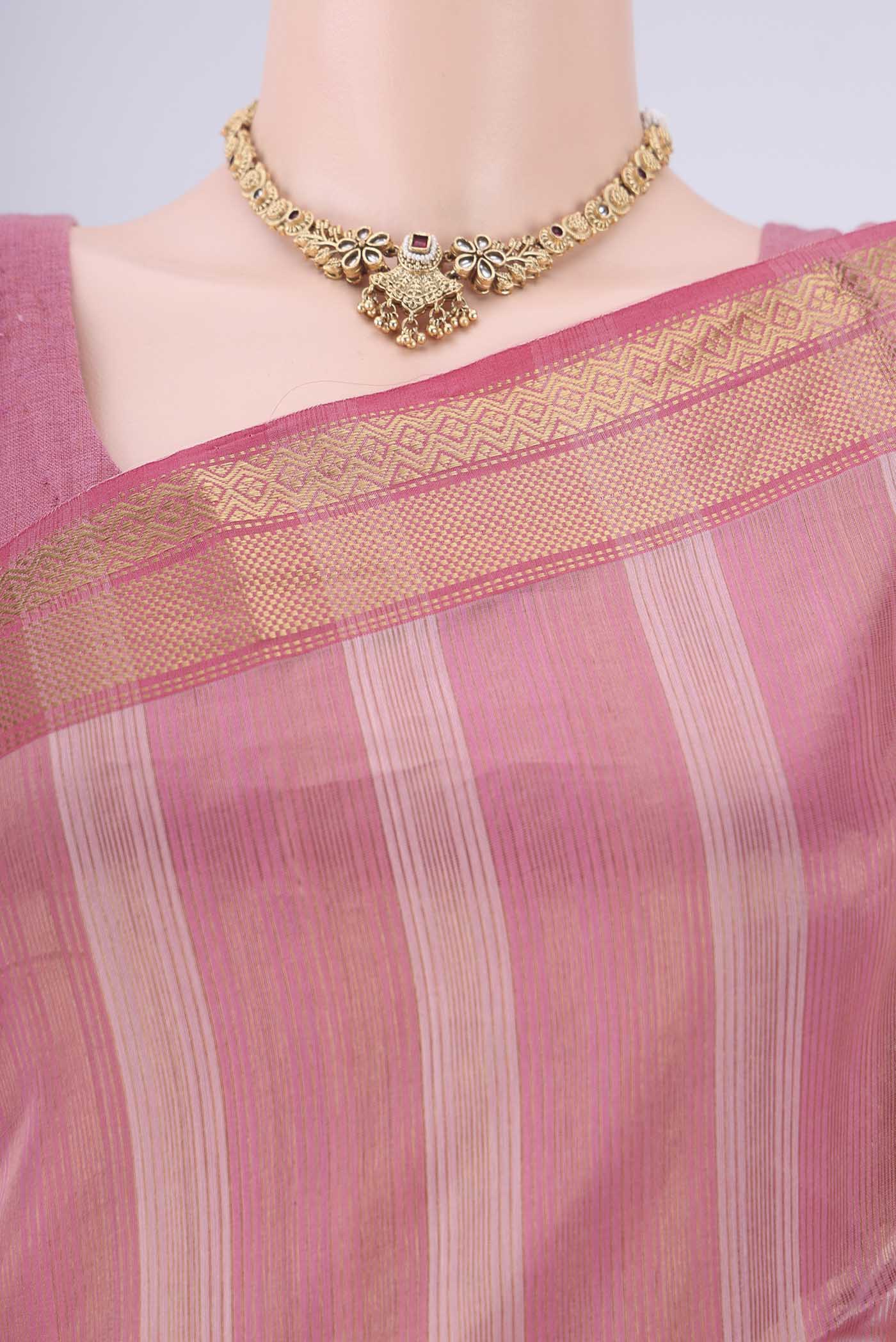 Border image of Peach Maheshwari Silk Cotton Saree with Stripes on the body and Zari Border. 