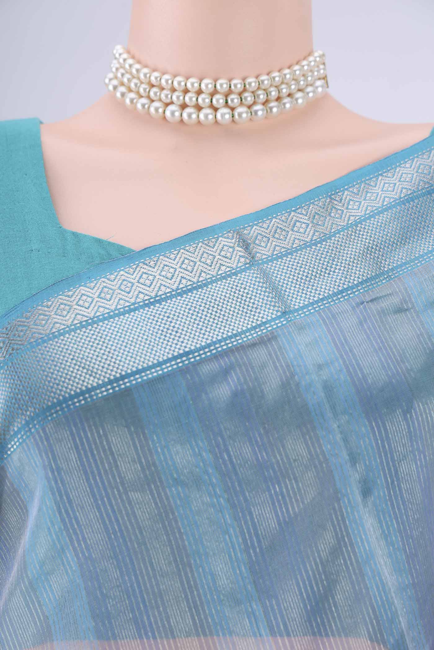 Border image of Sky Blue Maheshwari Silk Cotton Saree with Stripes on the body and Zari Border. 