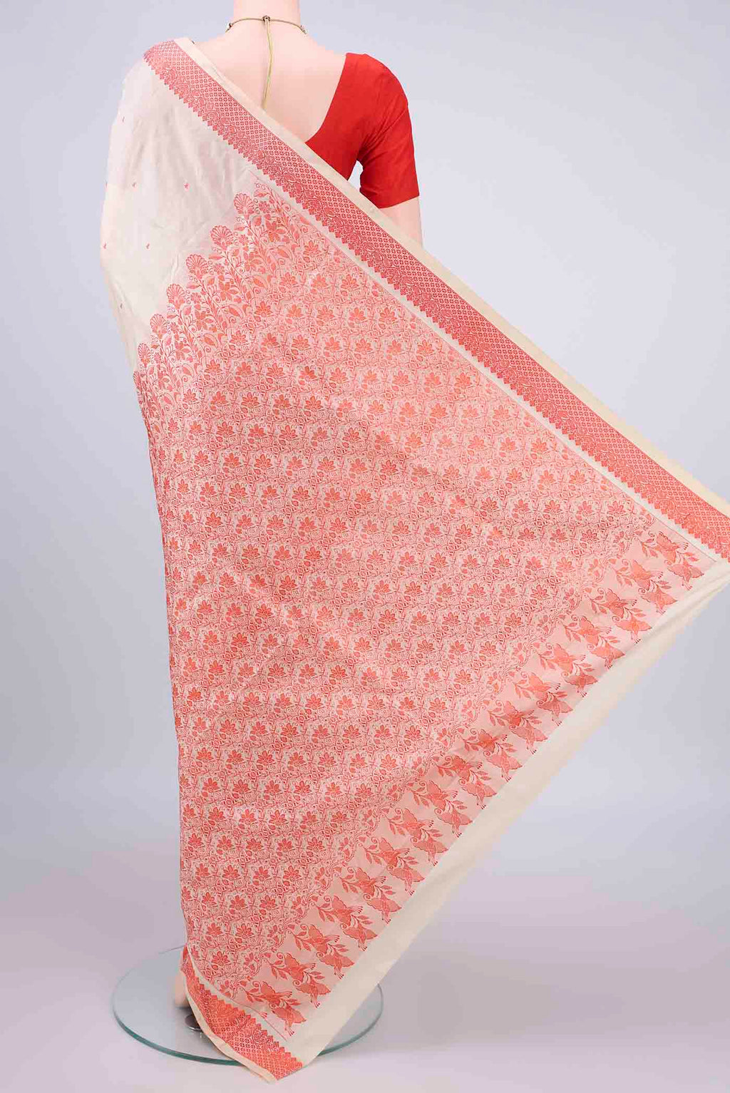 Flat view of Pure Silk Cream Kanchipuram Saree with Thread Butta on the body and Thread Border. 