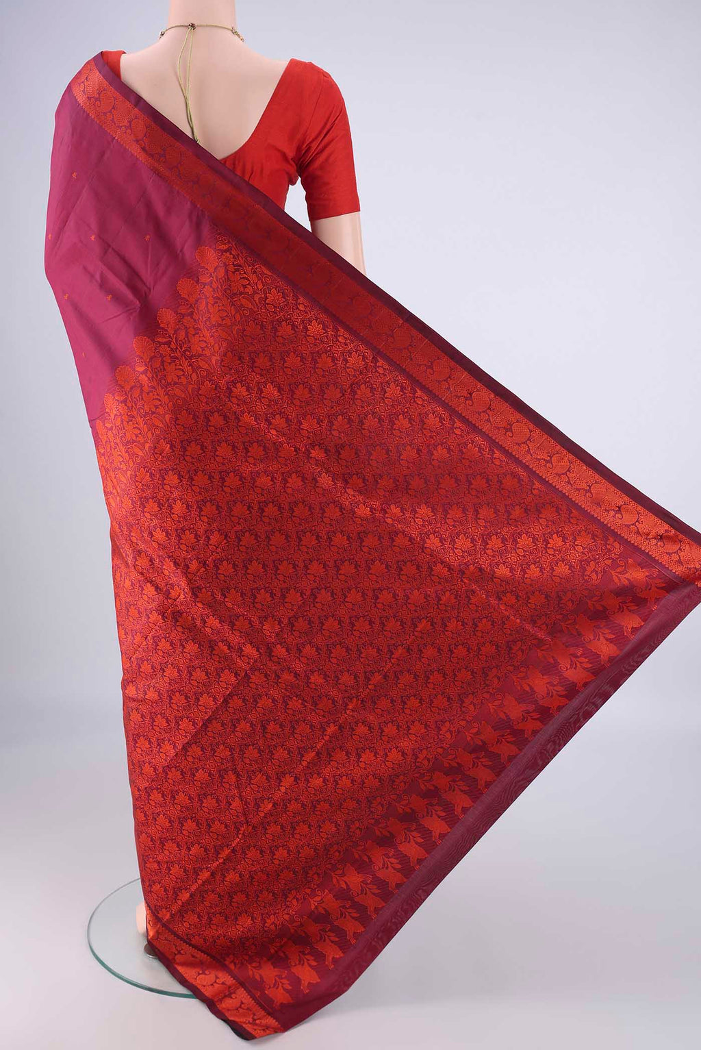 Flat view of Maroon Kanchipuram Silk Saree with Thread Butta on the body and Thread Border. 