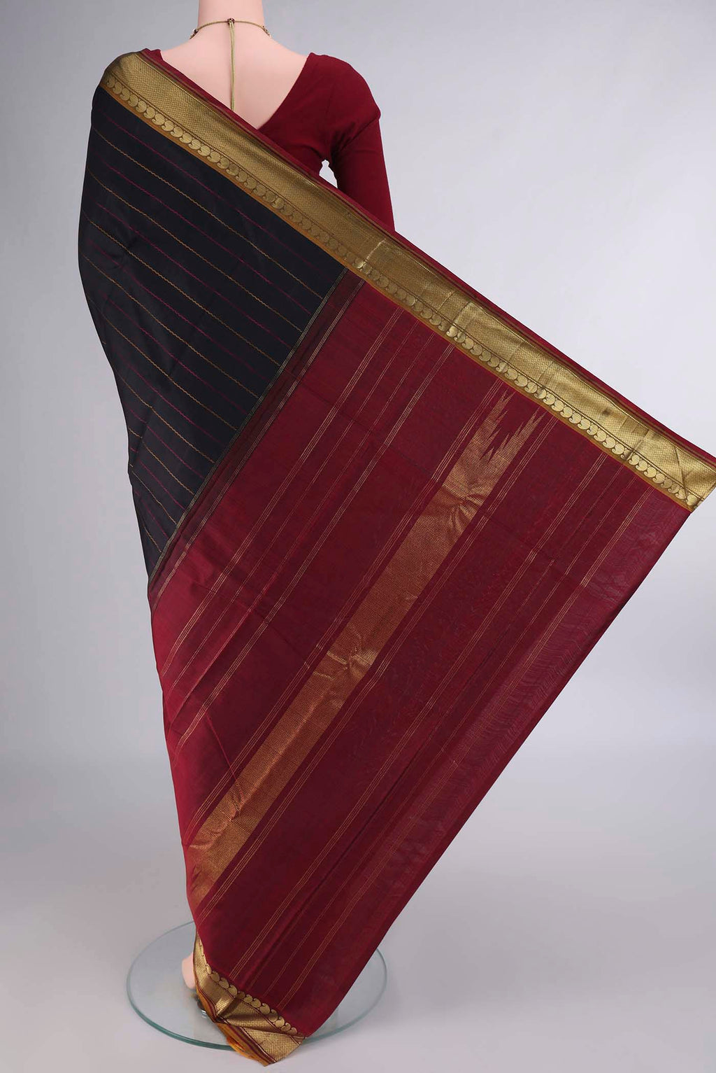 Flat view of Pure Silk Black Kanchipuram Saree with Veldhari on the body and Zari Border. 