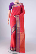 Pink Kanchipuram Silk Saree with Zari Butta on the body and Zari Border.  displayed on a mannequin