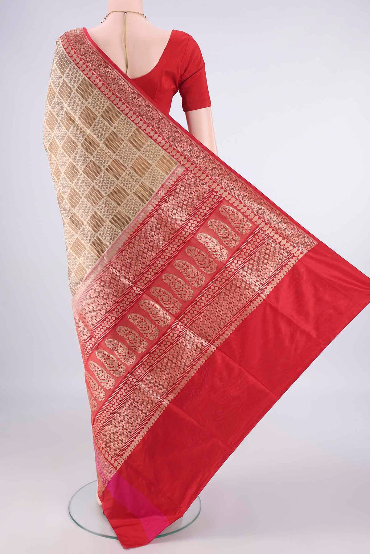 Flat view of Pure Silk Beige Banarasi Saree with Checked design on the body and Zari Border. 