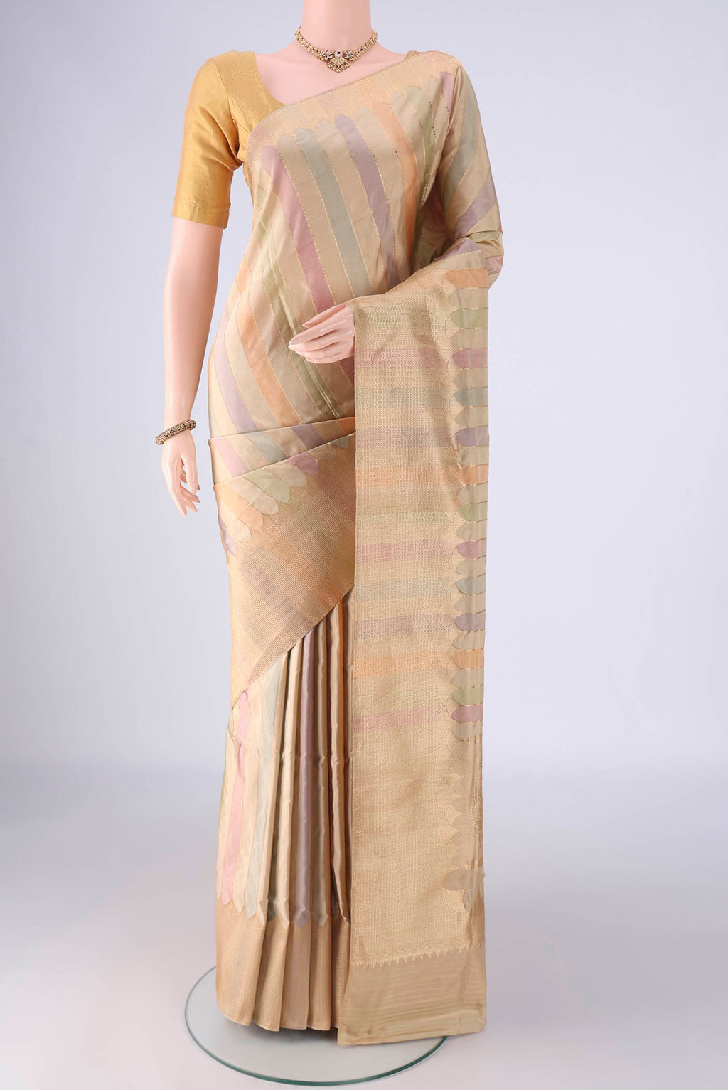 Multi Color Banarasi Silk Saree with Stripes on the body and Zari Border.  displayed on a mannequin
