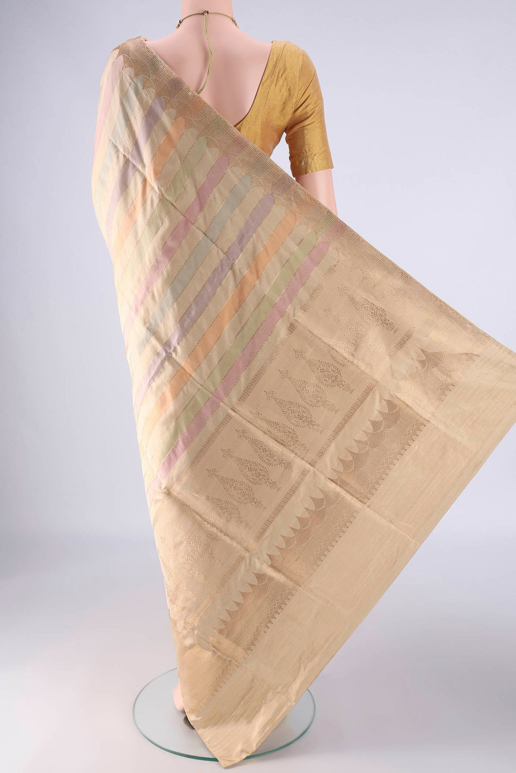 Flat view of Multi Color Banarasi Silk Saree with Stripes on the body and Zari Border. 