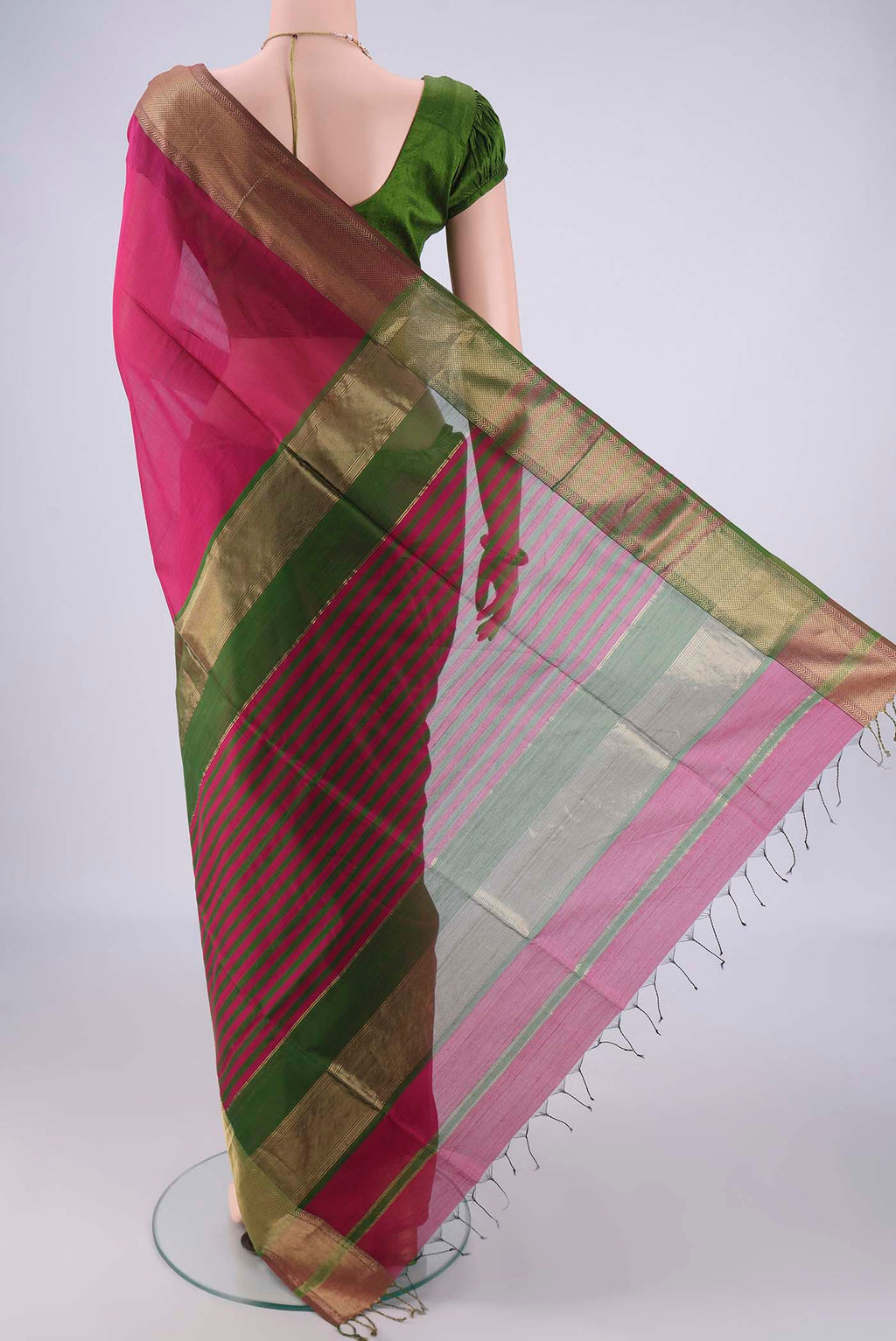 Flat view of Magenta Maheshwari Silk Cotton Saree with Plain Body and Zari Border. 