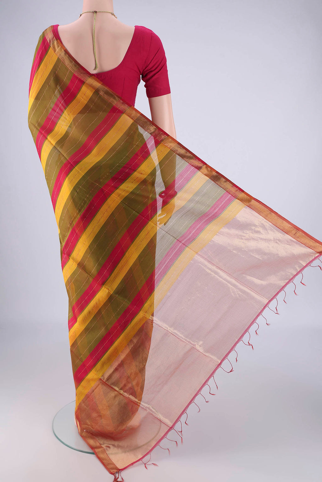 Flat view of Multi Color Maheshwari Silk Cotton Saree with Stripes on the body and Zari Border. 