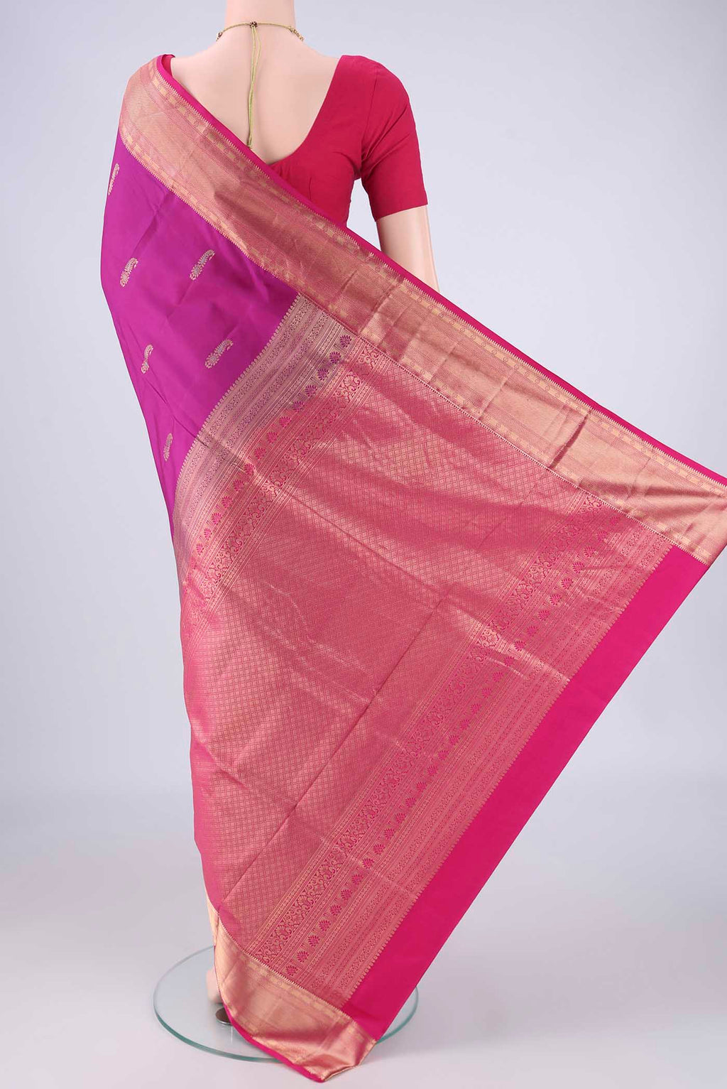 Flat view of Purple Soft Silk Saree with Zari Butta on the body and Zari Border. 