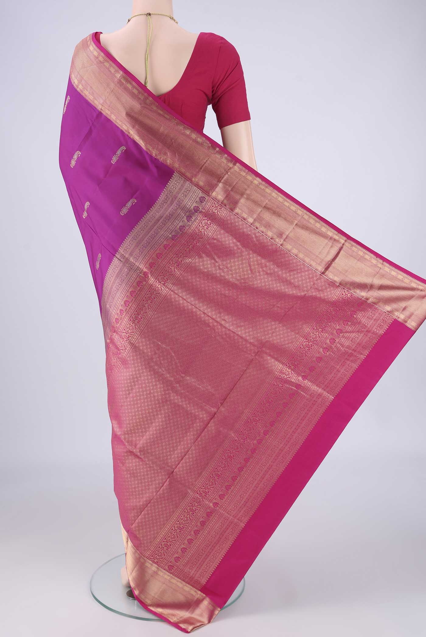Flat view of Purple Soft Silk Saree with Zari Butta on the body and Zari Border. 