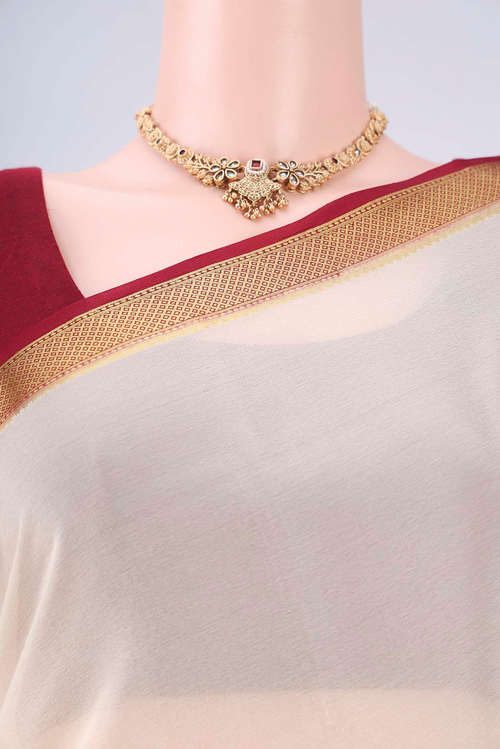 Border image of Off White Mysore Crepe Saree with Plain Body and Zari Border. 