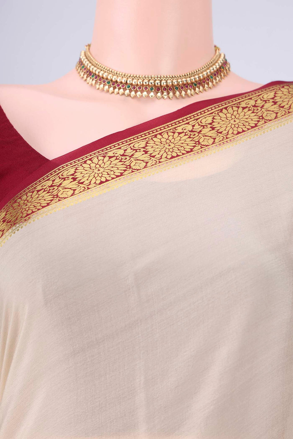 Border image of Cream Mysore Crepe Saree with Plain Body and Zari Border. 