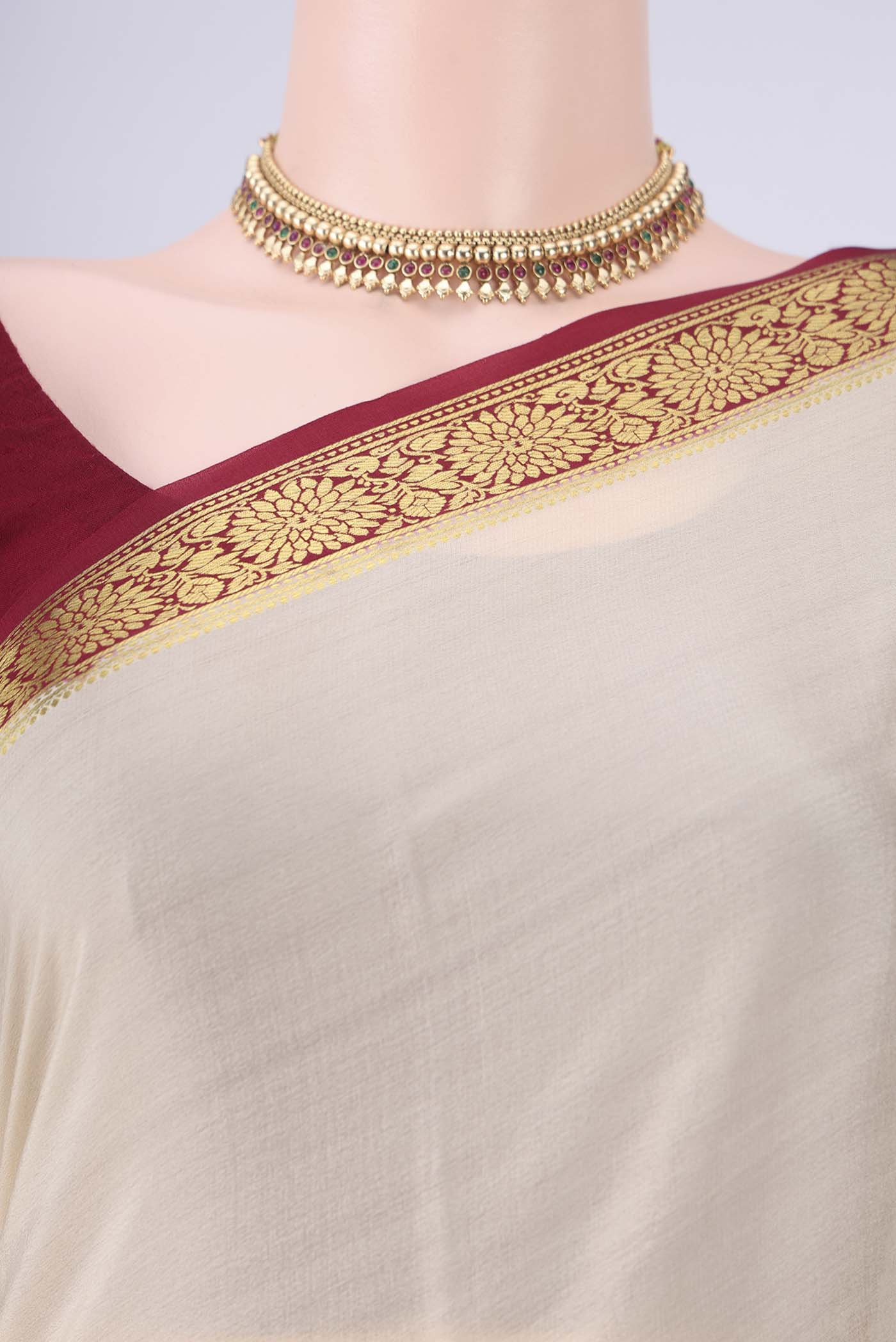 Border image of Cream Mysore Crepe Saree with Plain Body and Zari Border. 