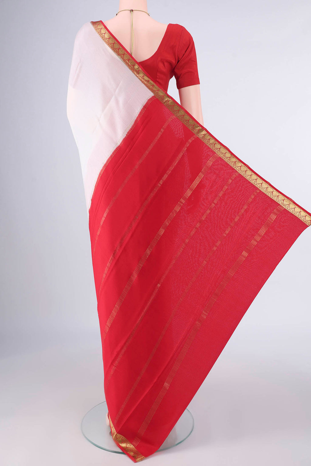 Flat view of Off White Mysore Crepe Saree with Plain Body and Zari Border. 