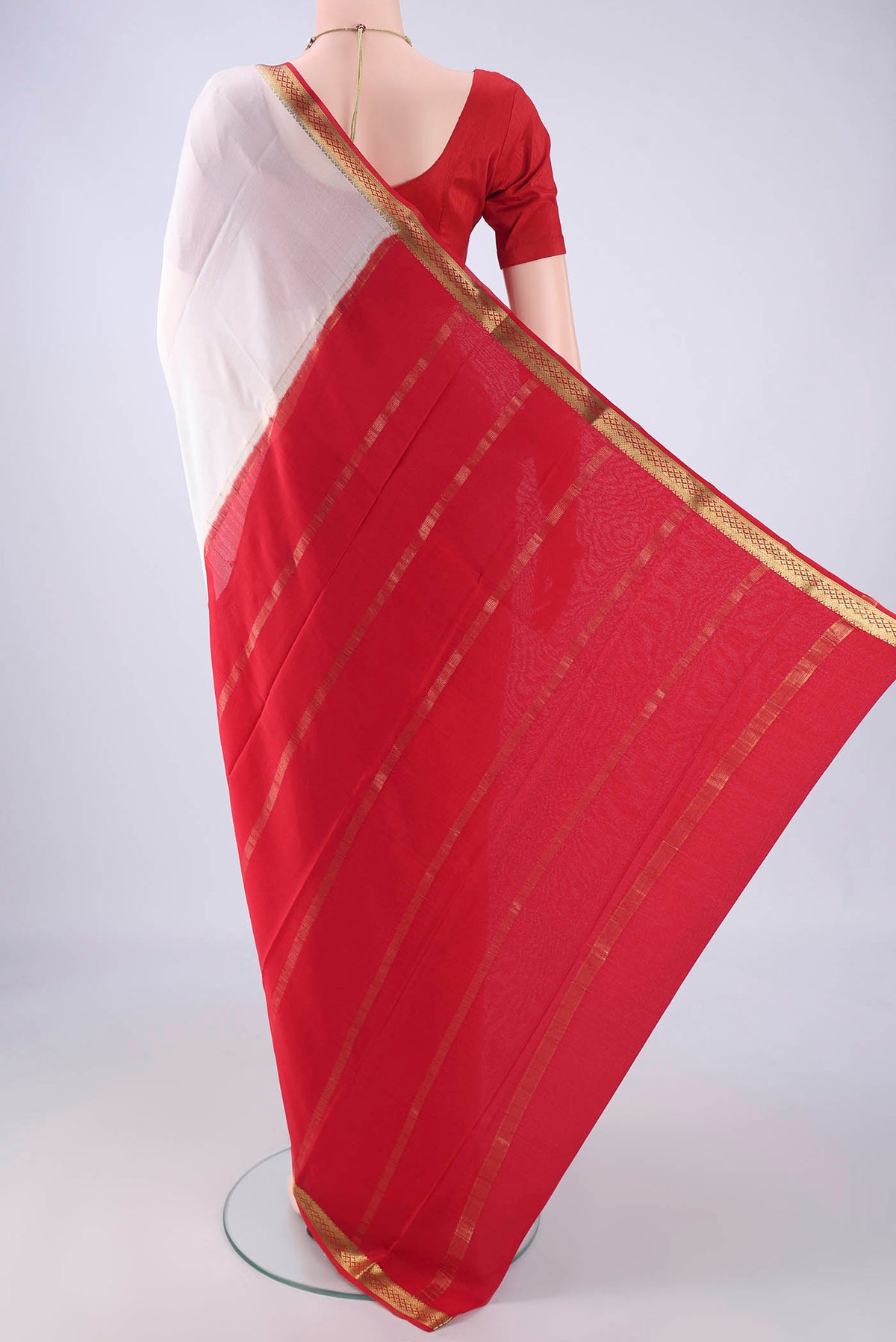 Flat view of White Mysore Crepe Saree with Plain Body and Zari Border. 