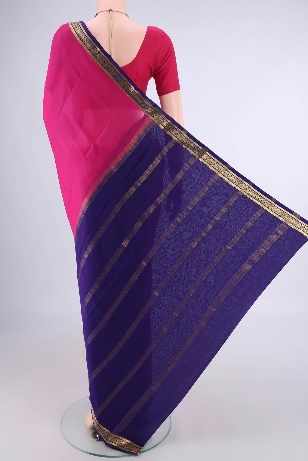 Flat view of Rani Pink Mysore Crepe Saree with Plain Body and Zari Border. 