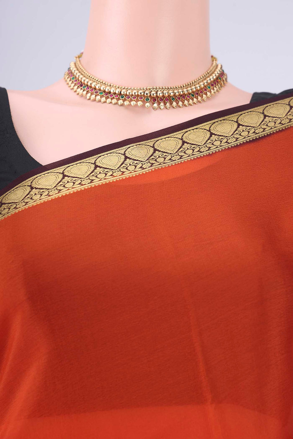 Border image of Rust Mysore Crepe Saree with Plain Body and Zari Border. 