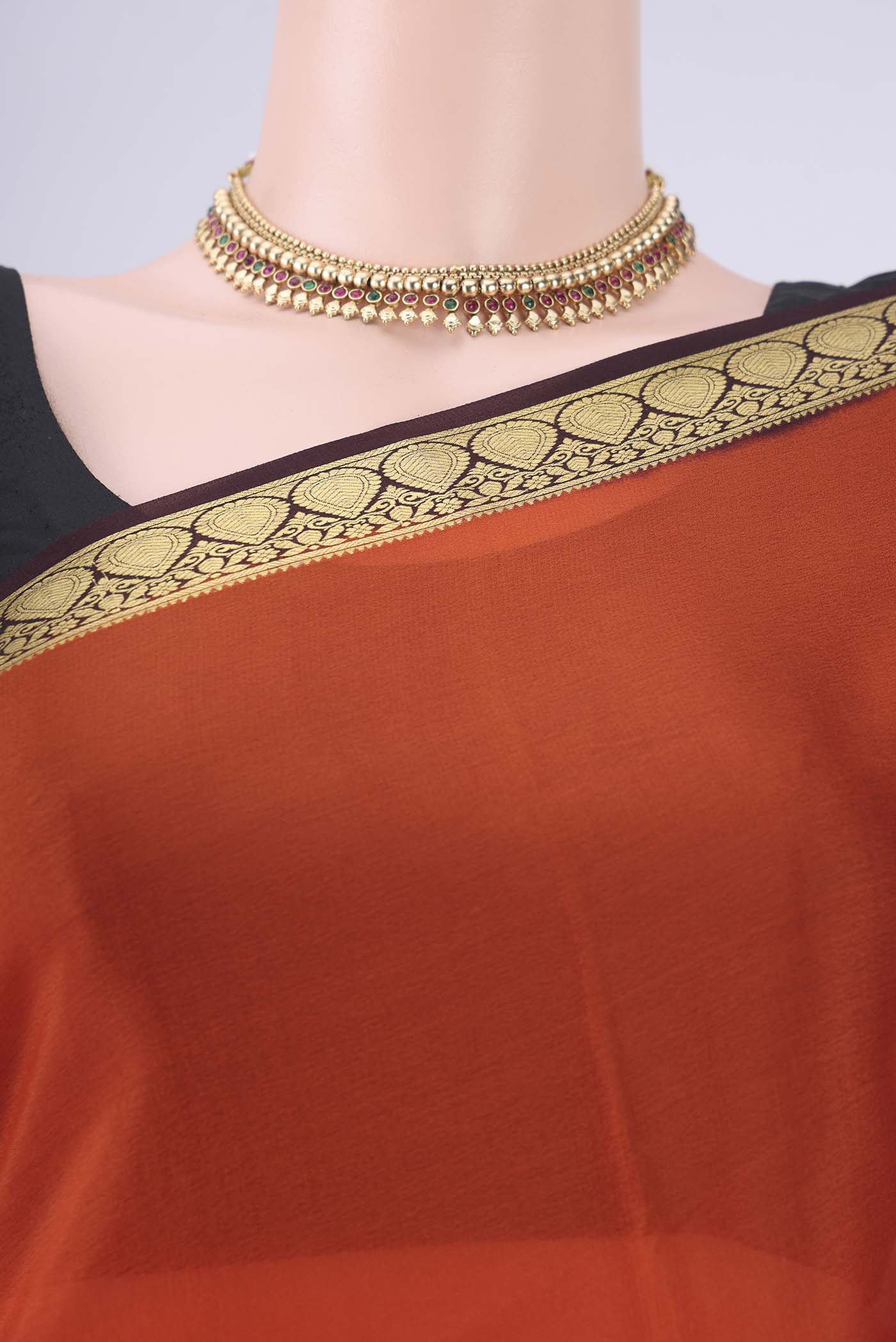 Border image of Rust Mysore Crepe Saree with Plain Body and Zari Border. 