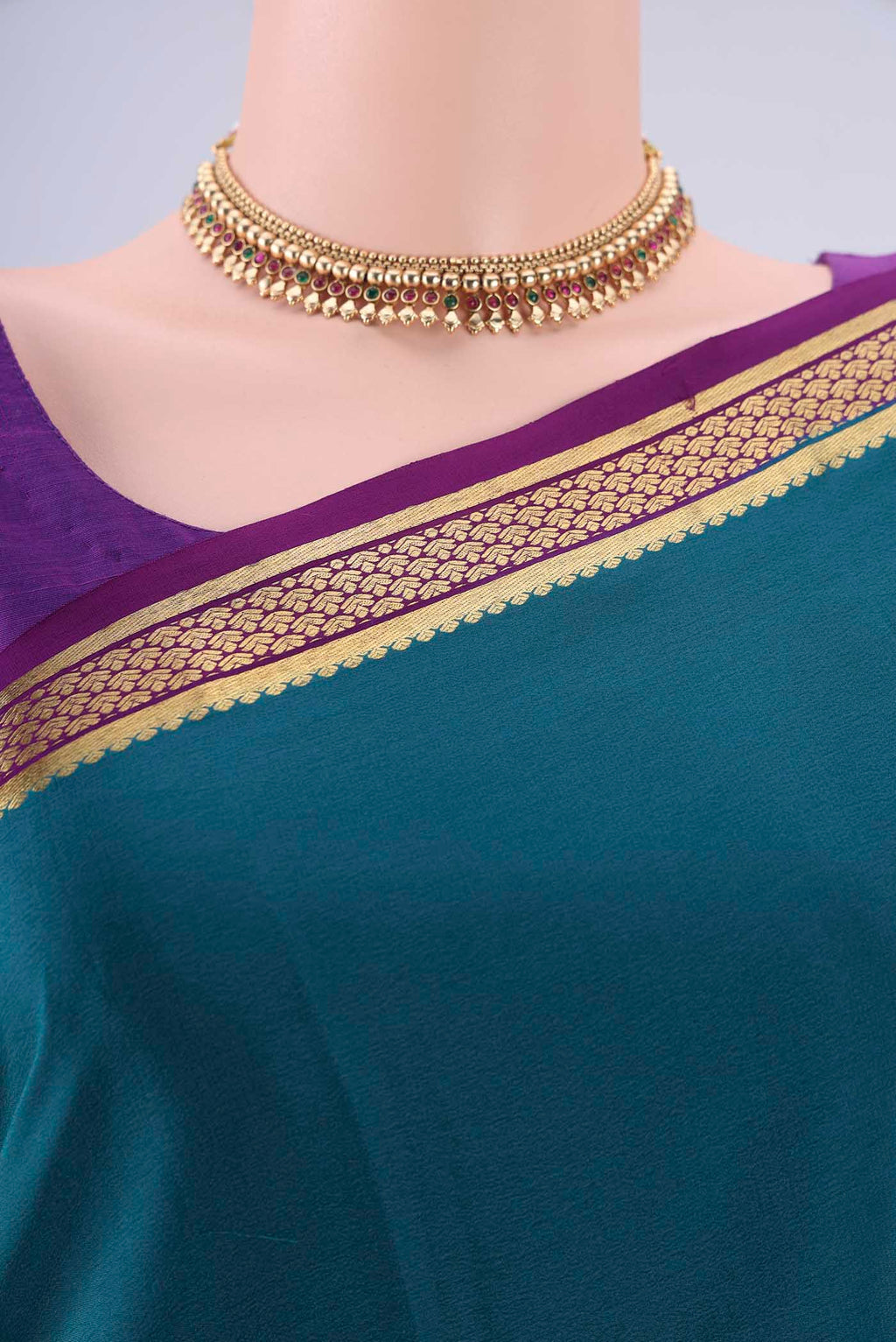 Border image of Teal Mysore Crepe Saree with Plain Body and Zari Border. 