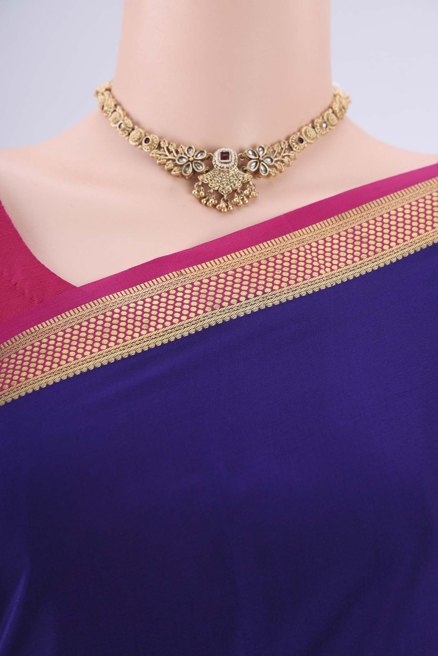 Border image of Navy Blue Mysore Crepe Saree with Plain Body and Zari Border. 