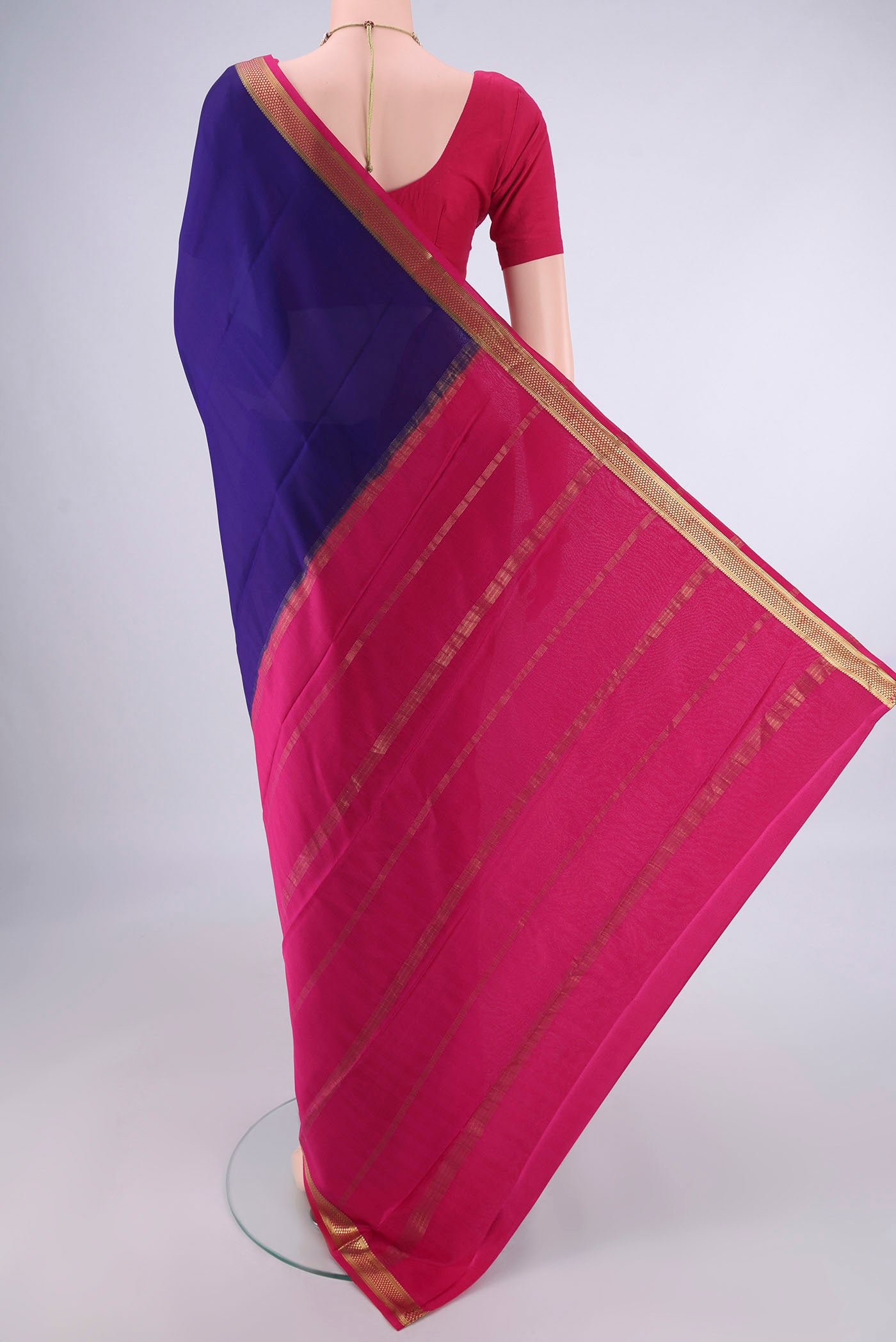 Flat view of Navy Blue Mysore Crepe Saree with Plain Body and Zari Border. 