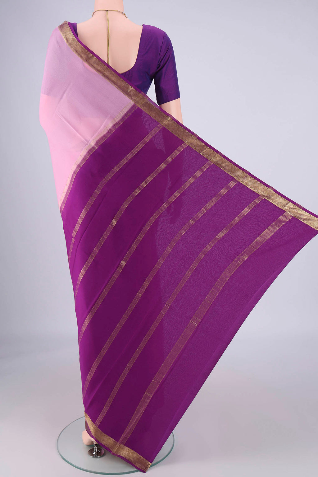 Flat view of Pink Mysore Crepe Saree with Plain Body and Zari Border. 