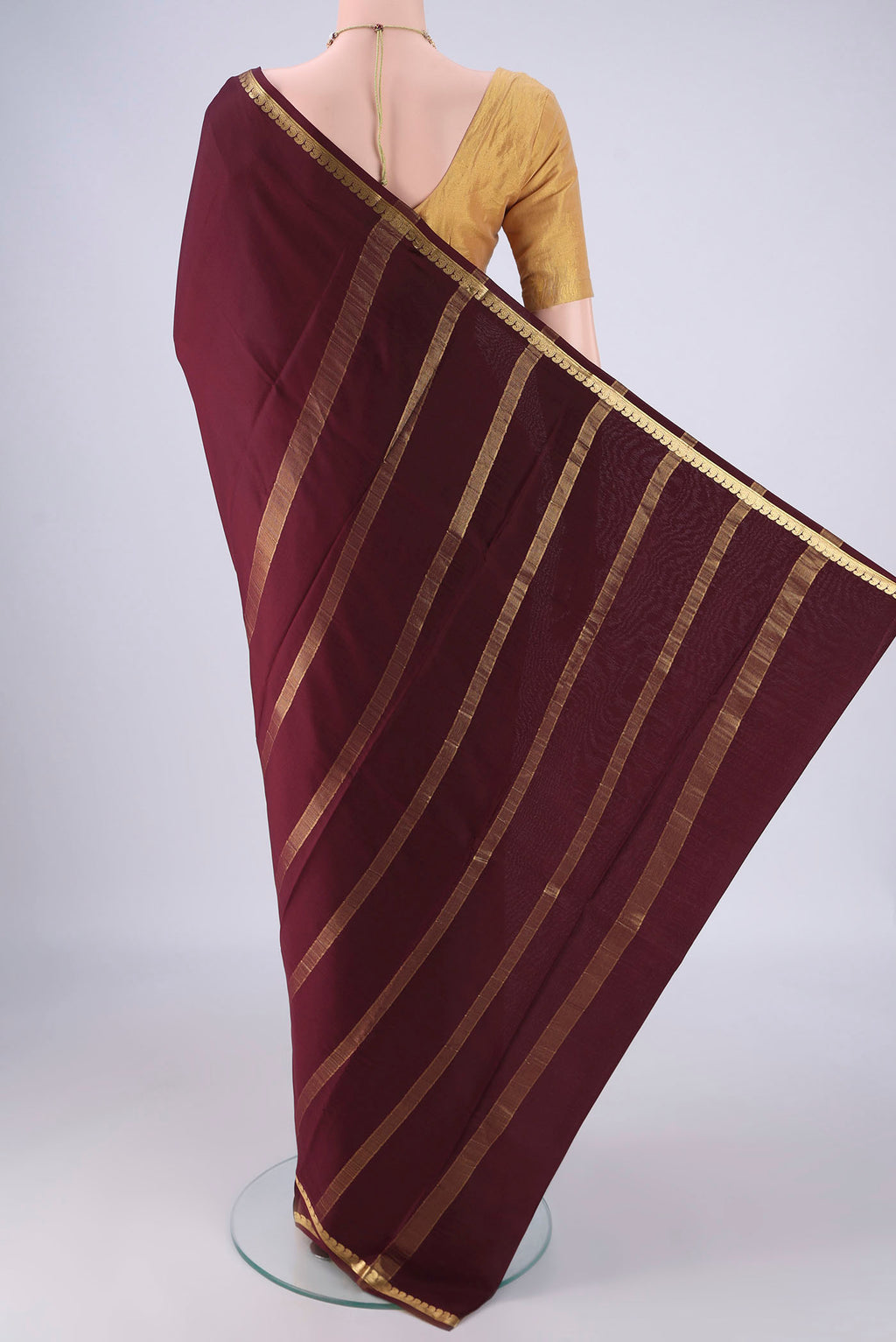 Flat view of Coffee Brown Mysore Crepe Saree with Plain Body and Zari Border. 