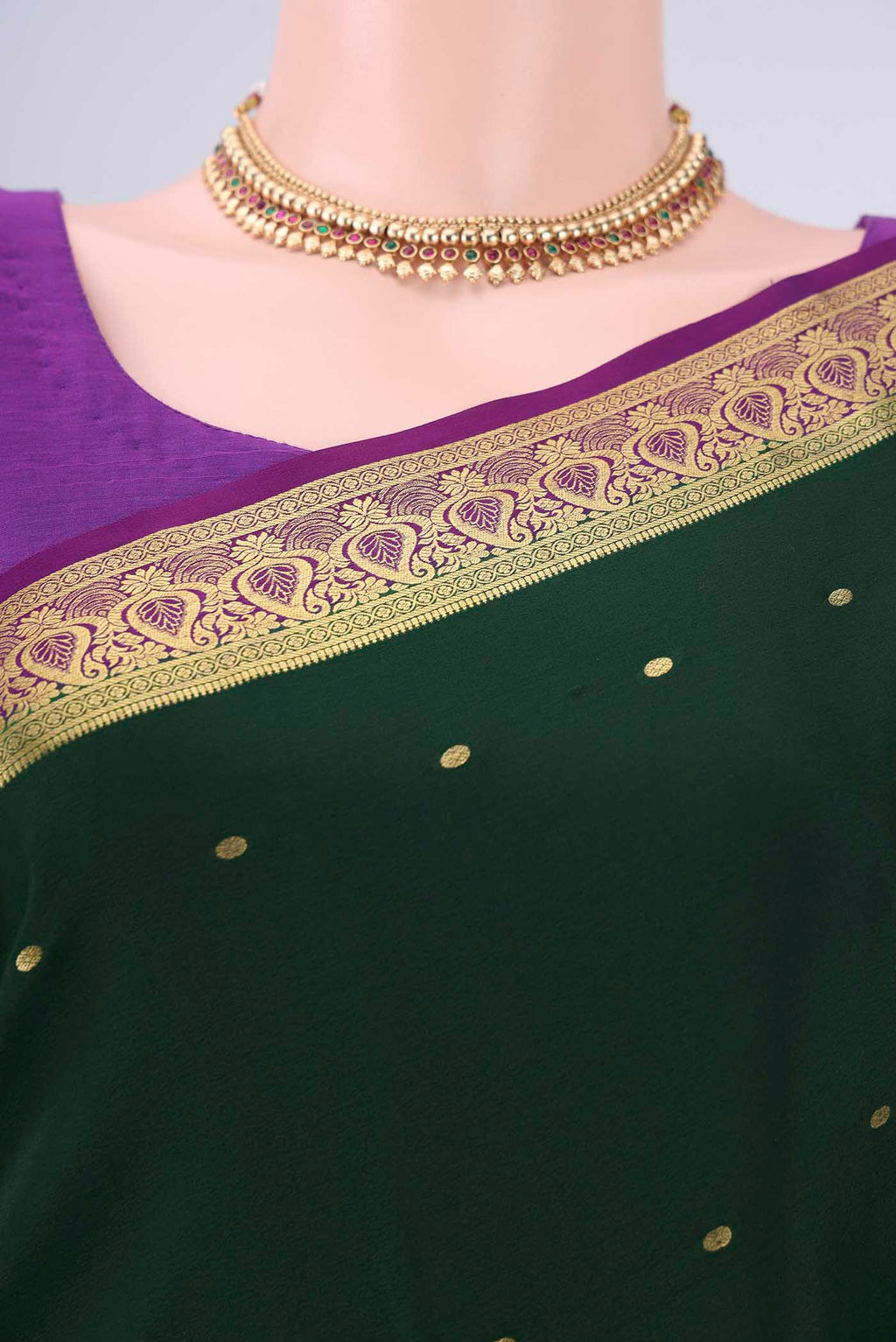 Border image of Bottle Green Mysore Crepe Saree with Zari Butta on the body and Zari Border. 