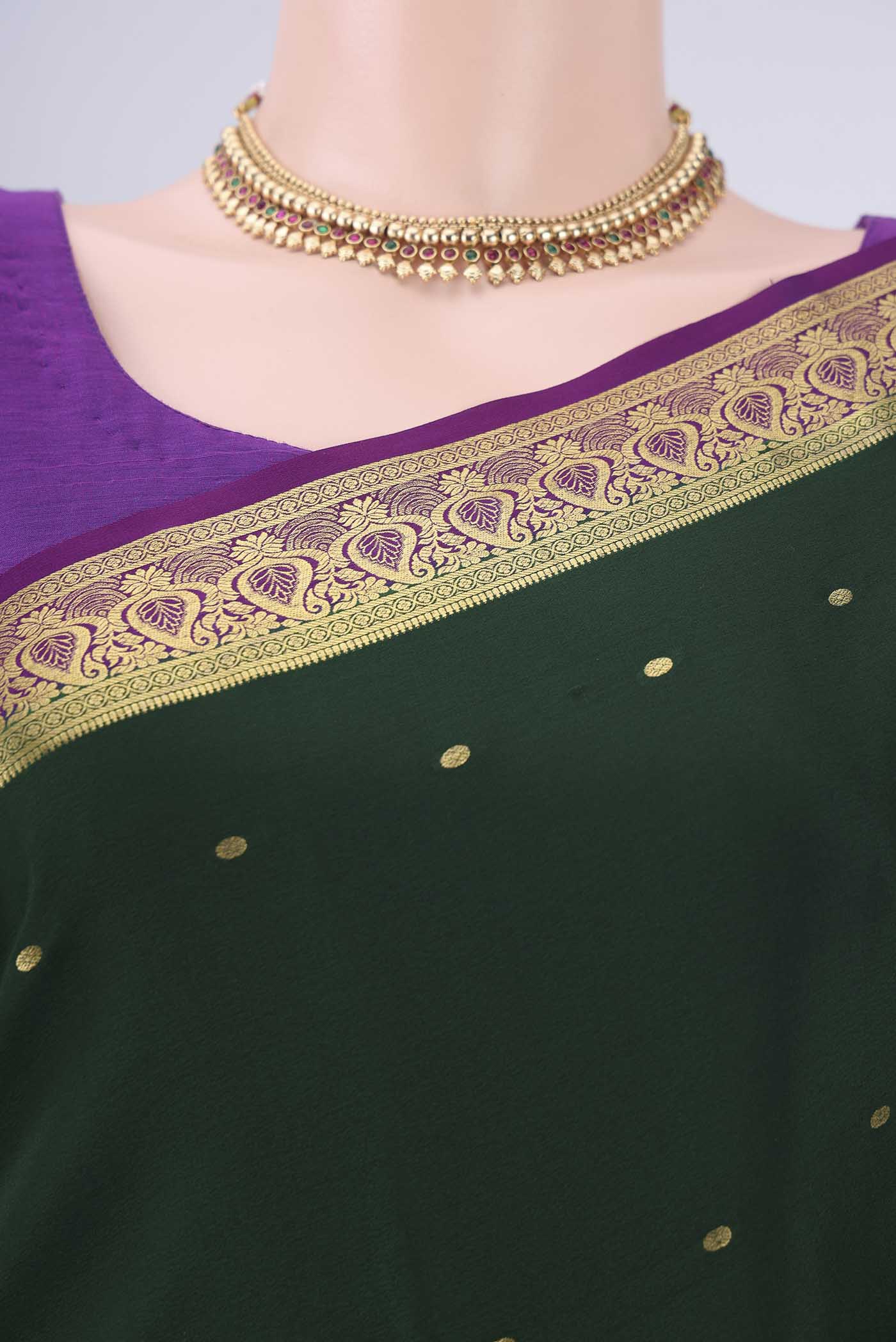 Border image of Bottle Green Mysore Crepe Saree with Zari Butta on the body and Zari Border. 