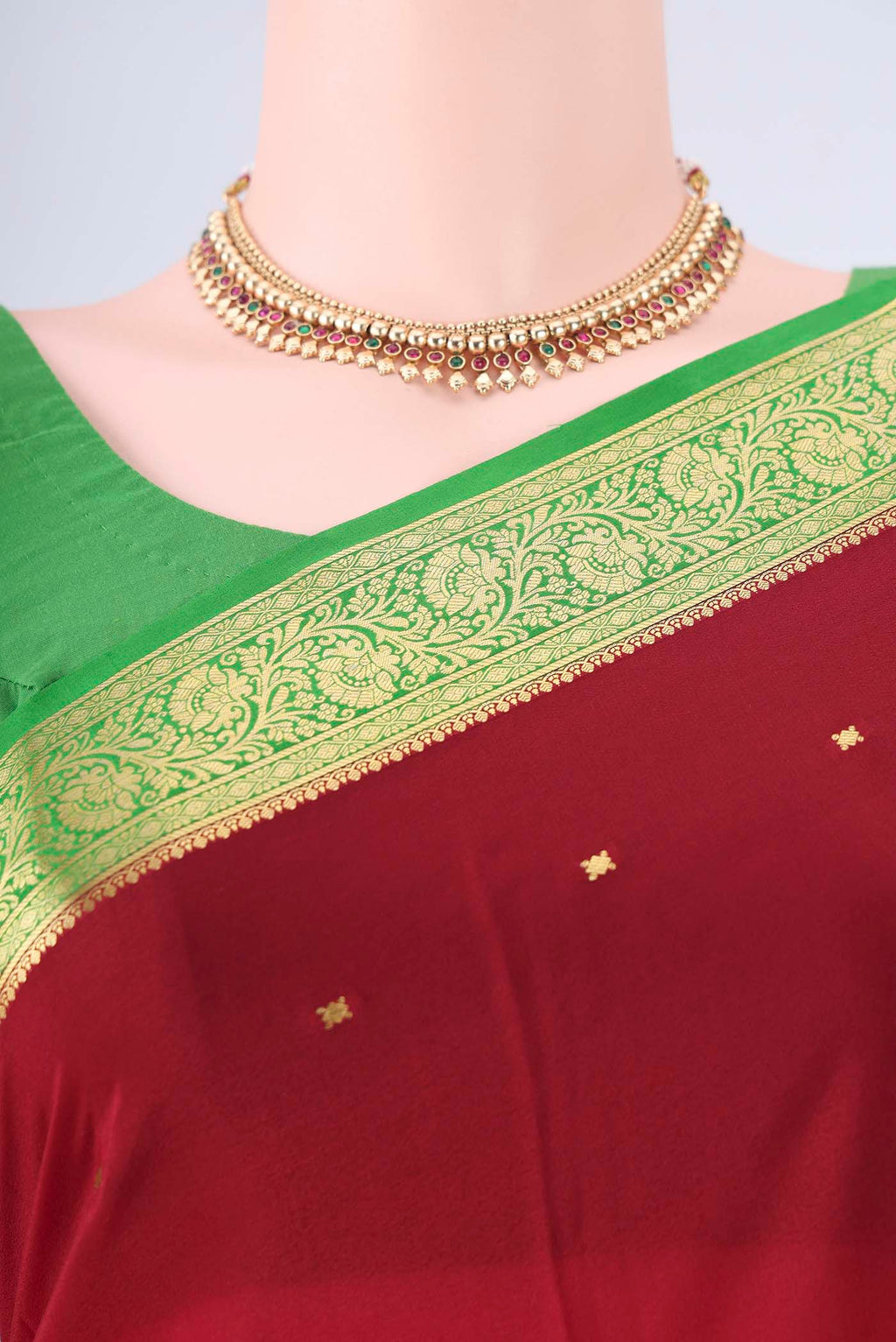 Border image of Maroon Mysore Crepe Saree with Zari Butta on the body and Zari Border. 