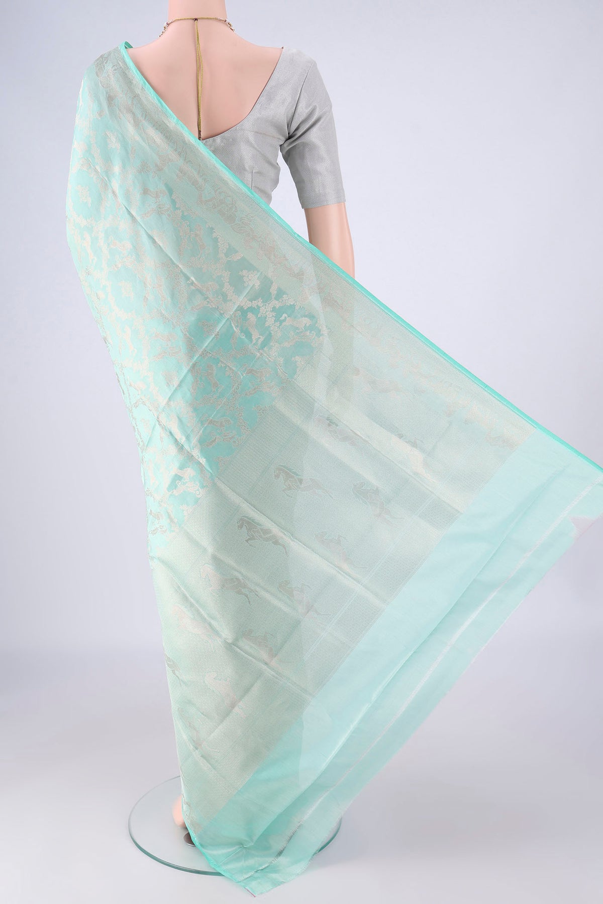 Flat view of Light Blue Banarasi Silk Saree with Zari Brocade on the body and Zari Border. 