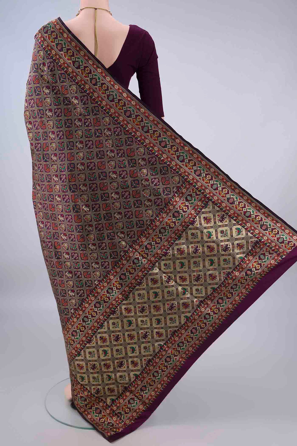 Flat view of Pure Silk Purple Banarasi Saree with Zari And Thread Butta on the body and Zari Border. 