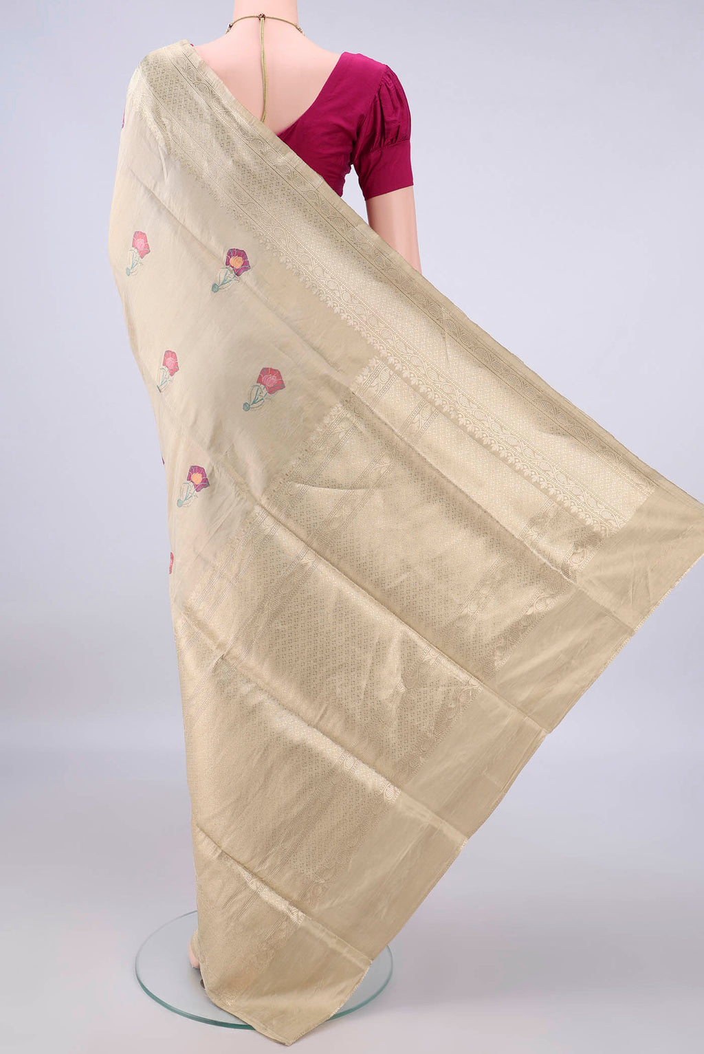 Flat view of Beige Banarasi Saree with Zari And Thread Butta on the body and Zari Border. 