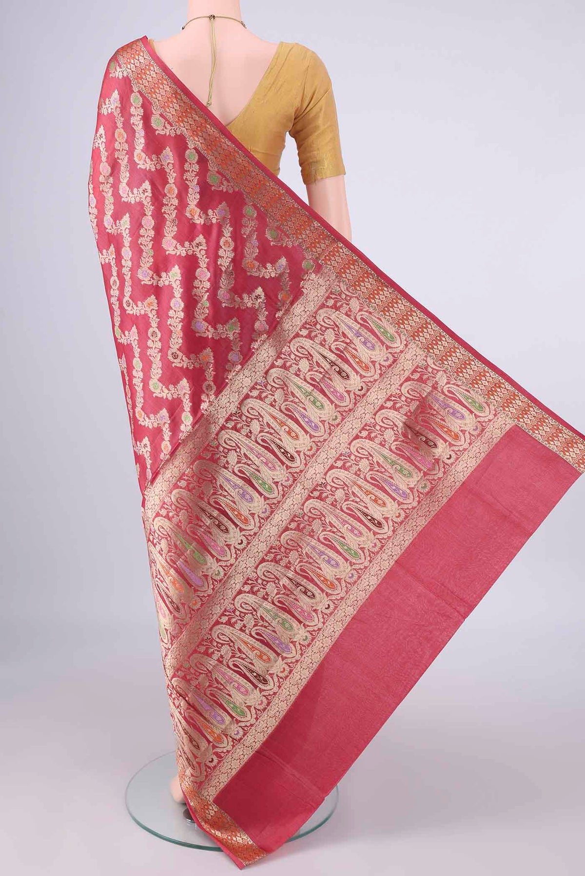 Flat view of Rust Banarasi Tussar Saree with Zari Brocade on the body and Zari And Thread Border. 