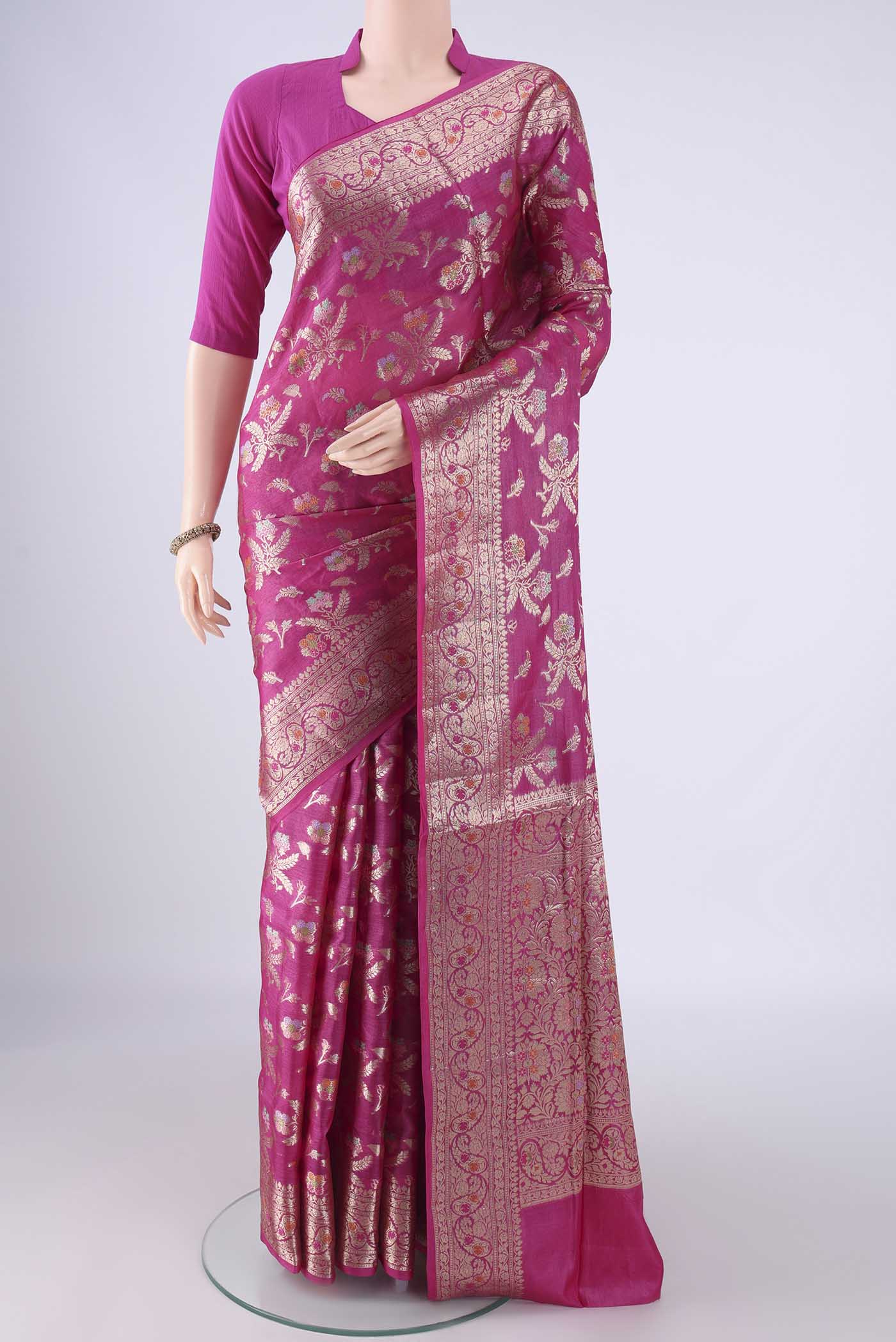 Rani Pink Banarasi Tussar Silk Saree with Zari And Thread Butta on the body and Zari Border.  displayed on a mannequin