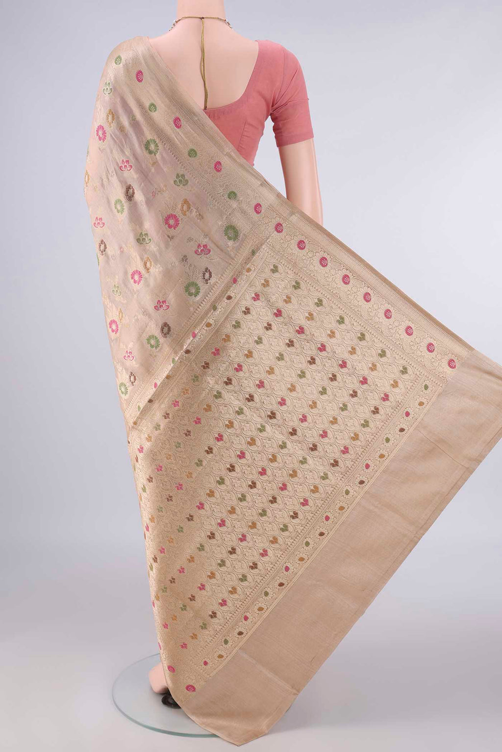 Flat view of Beige Banarasi Tussar Saree with Zari And Thread Butta on the body and Zari Border. 