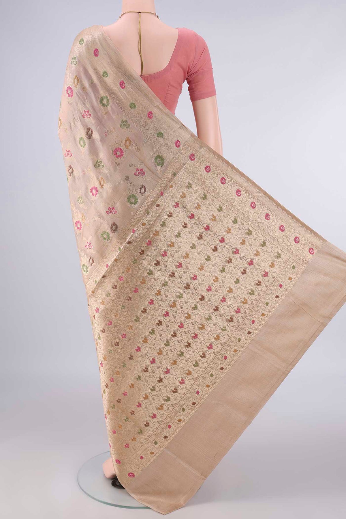 Flat view of Beige Banarasi Tussar Saree with Zari And Thread Butta on the body and Zari Border. 