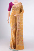 Mustard Banarasi Tussar Saree with Zari And Thread Butta on the body and Zari And Thread Border.  displayed on a mannequin