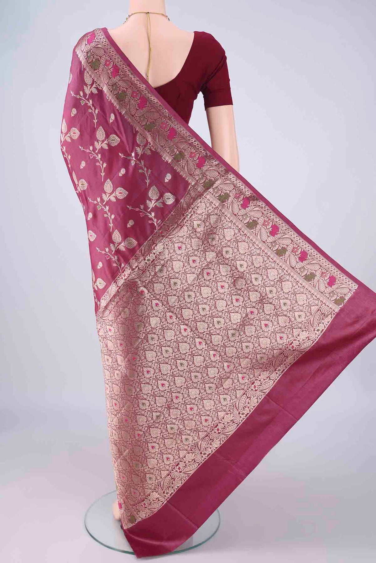 Flat view of Magenta Banarasi Tussar Silk Saree with Zari And Thread Butta on the body and Zari Border. 