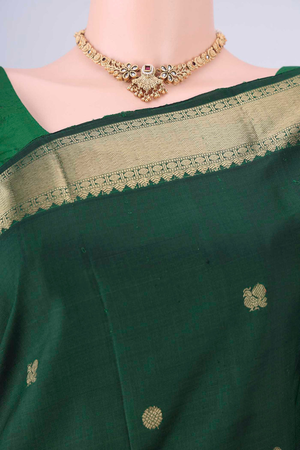 Border image of Bottle Green Kanjivaram Silk Saree with Zari Butta on the body and Zari Border. 